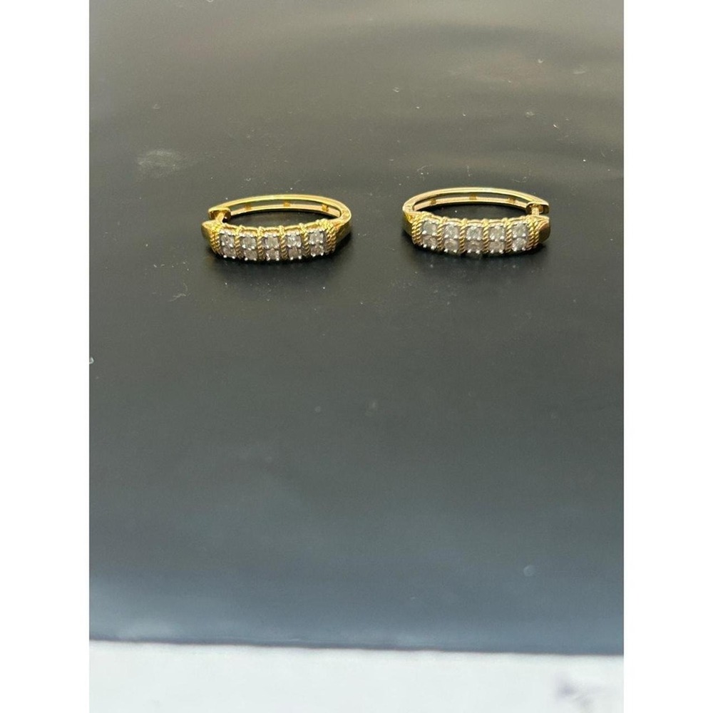 Elegant hoop earrings feature a double row of natural diamond set in 14K Gold